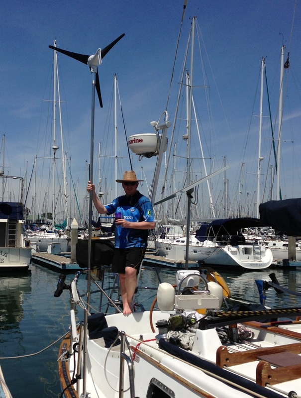 wind generator mounted on sailboat using CMP pole system and rigid marine panel mounted top or pole
