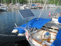 rigid marine solar panel mounted top of pole on sailboat